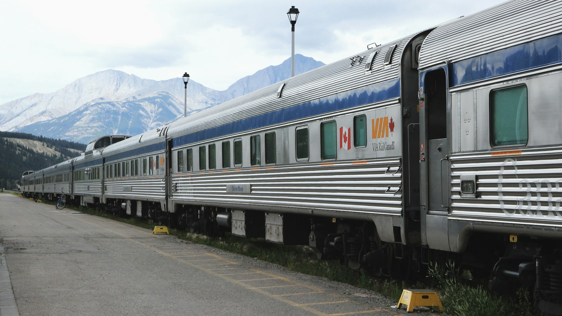 grey and blue train on train station during daytime